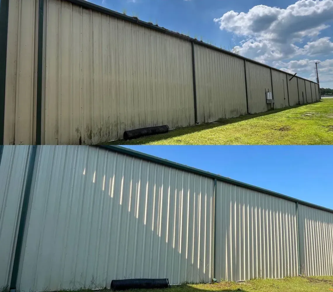 A split-screen comparison showing a beige metal warehouse wall before and after professional cleaning.