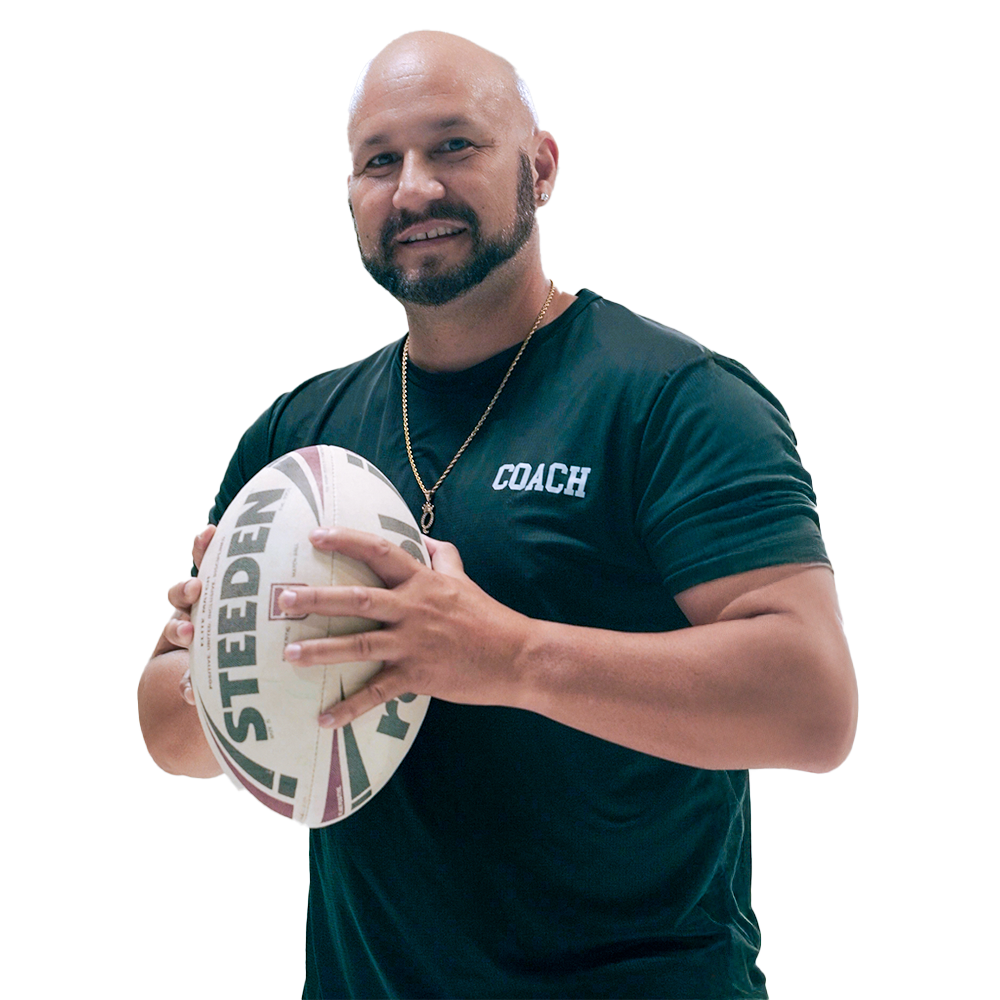 Quintin Wakefield holding a steeden rugby ball in his hands