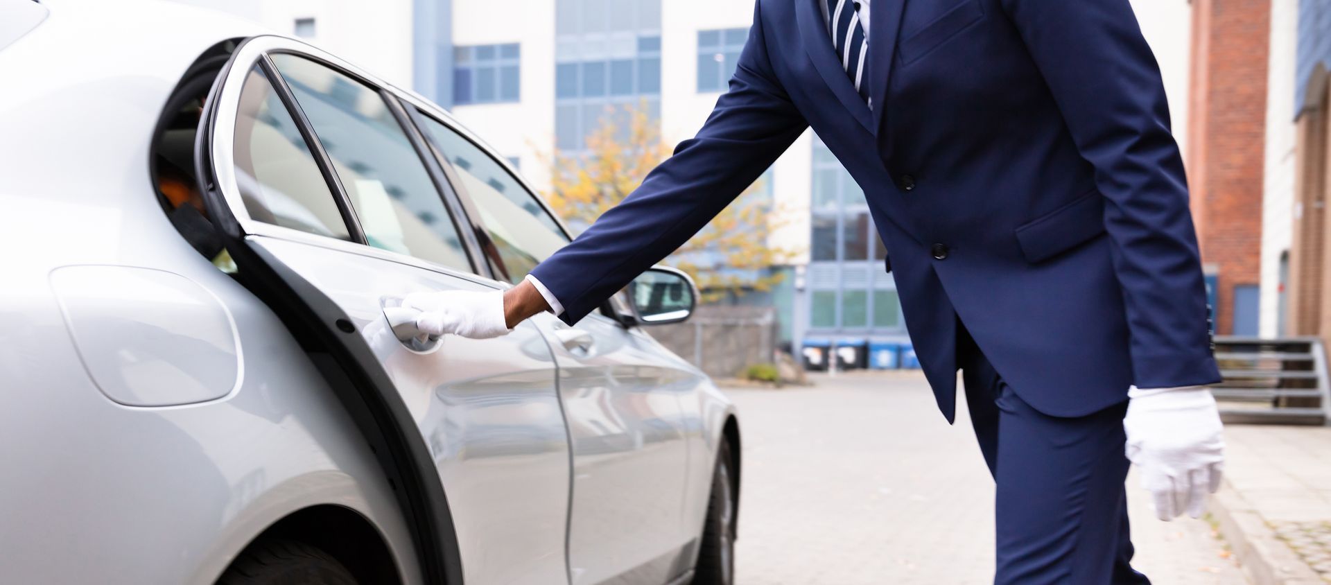A Valet Employee Opening Car Door - Pittsburgh, PA - William Penn Parking