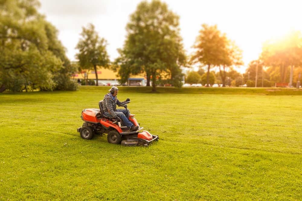 Ride On Lawn Mower — Professional Gardening Services in The Range, QLD