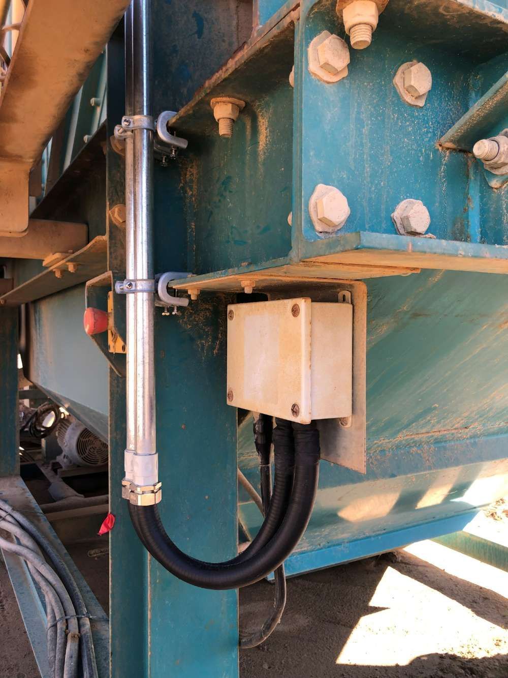 A Close Up Of A Metal Structure With A Hose Attached To It — BayCoast Electrical & Control Solutions in Maloneys Beach, NSW