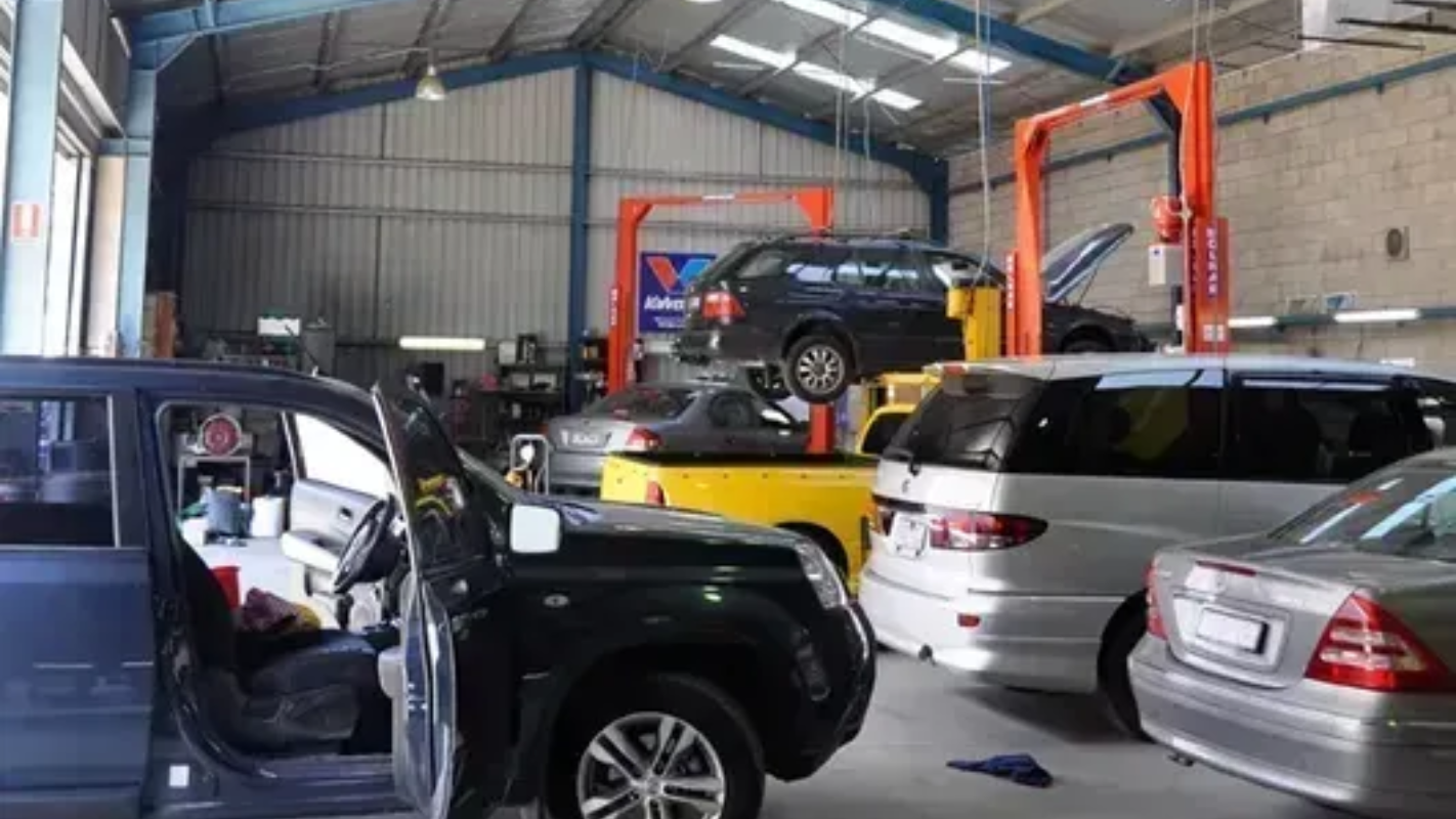An Auto Repair Shop Interior Featuring Multiple Vehicles — Maddock Motors-Wodonga Auto Air In Wodonga, VIC