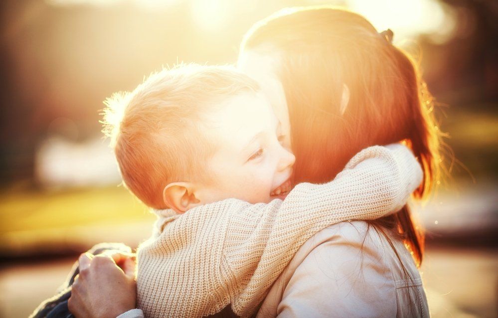Mother holding her son