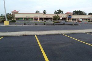 Asphalt parking lot after paving service in Buffalo, NY