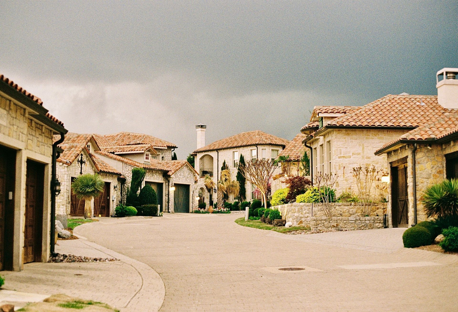 Street of stone single-family rental homes in a North Texas suburb