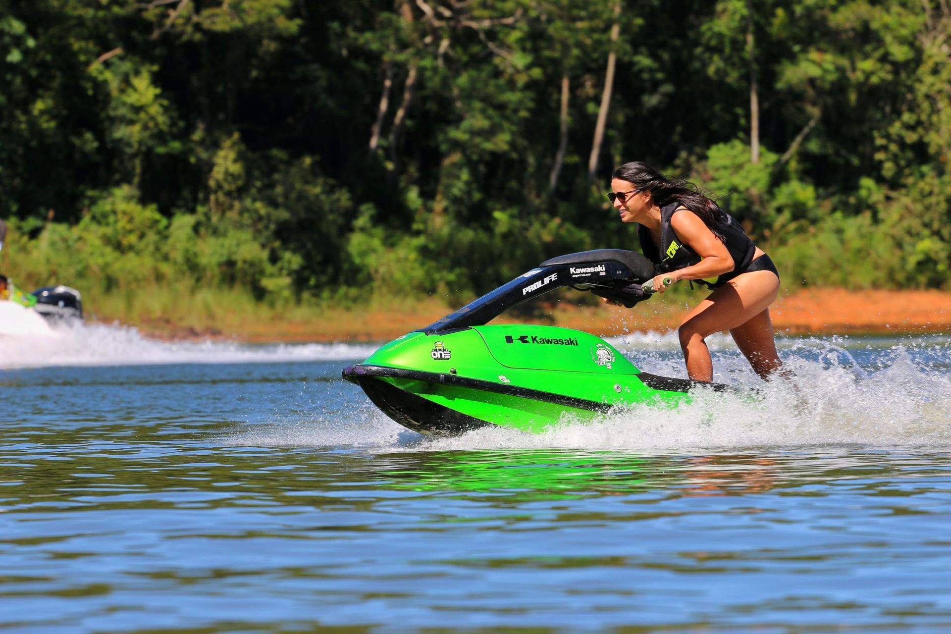 Personal watercraft on a trailer at a North Texas lake boat ramp on a summer morning