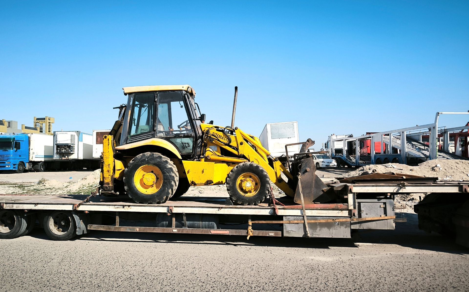 Heavy haul truck staged in a North Texas equipment yard before running oilfield loads