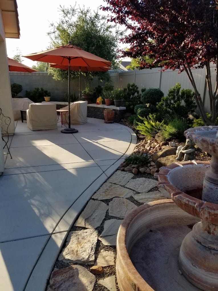 Stamped concrete patio in a Stockton backyard with decorative pattern and modern design