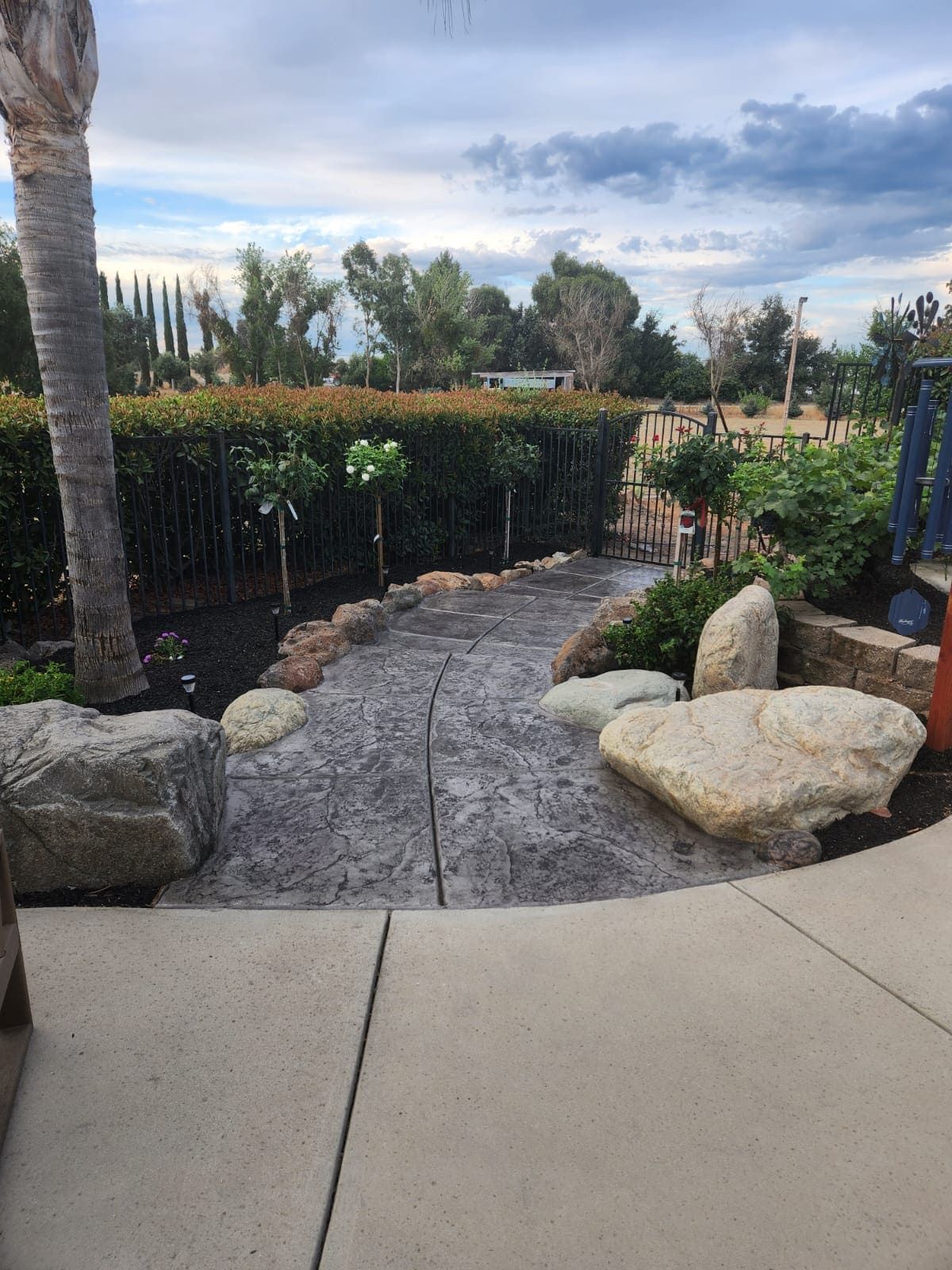 Landscaped walkway design completed by Drago Inc. in Modesto, CA