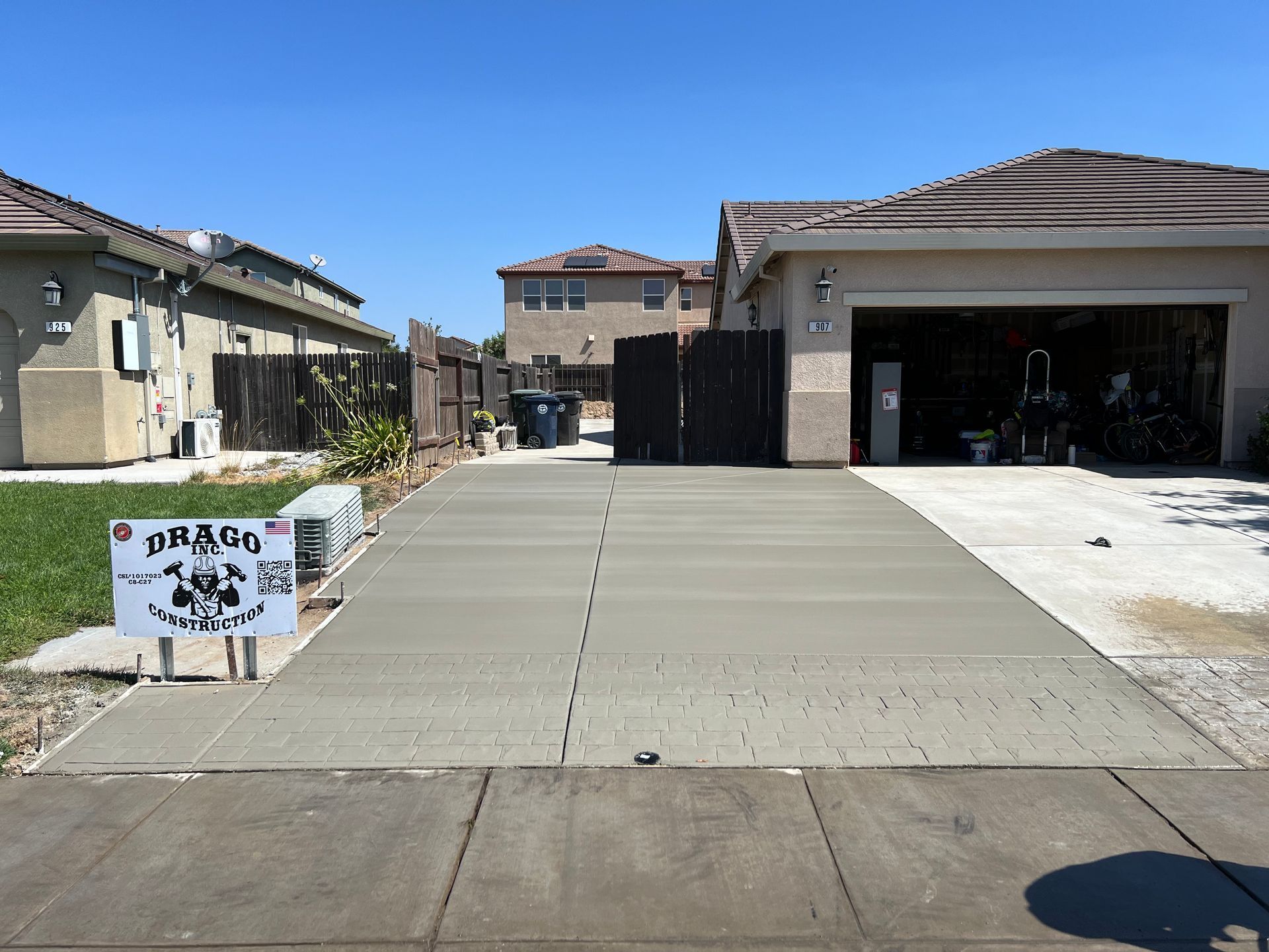 Wide front view of a concrete driveway installed by Drago Inc. in Stockton, CA