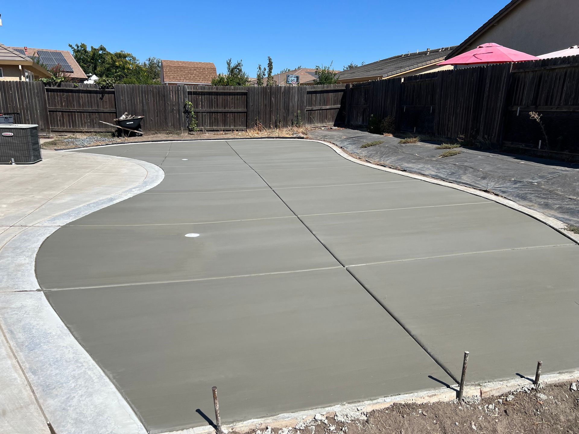 Backyard concrete driveway installed by Drago Inc. in Stockton, CA