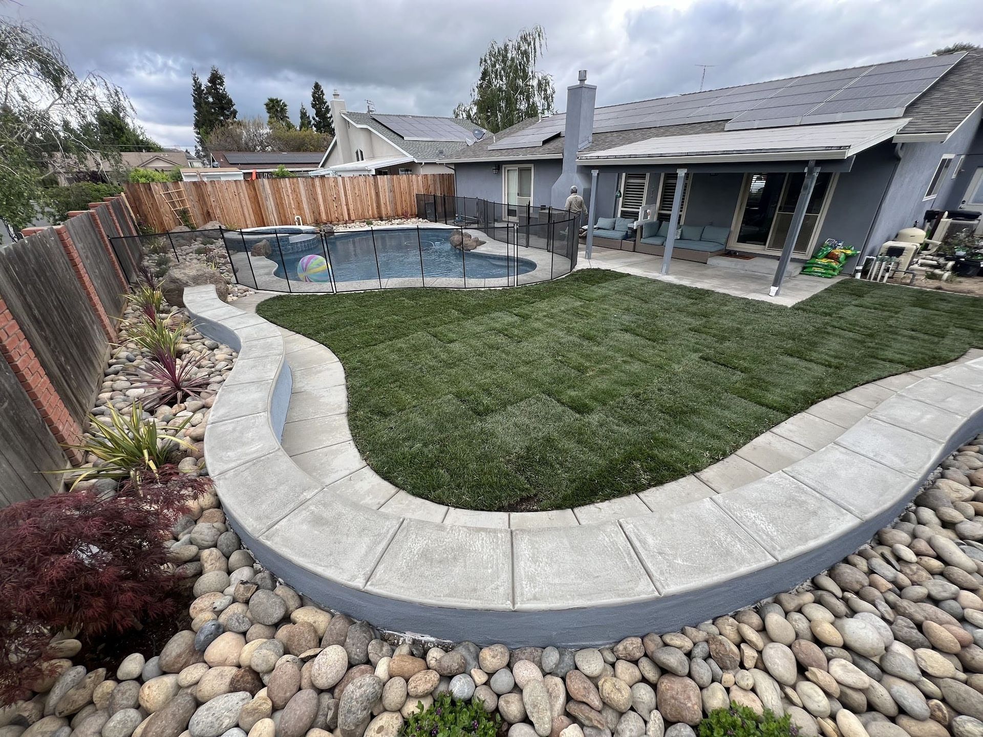 Concrete patio with shade structure installation in Stockton.