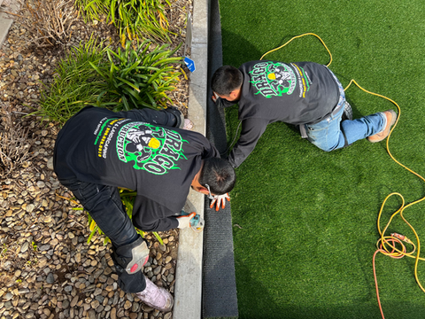 Drago Inc team installing artificial turf at a residential home in Stockton CA