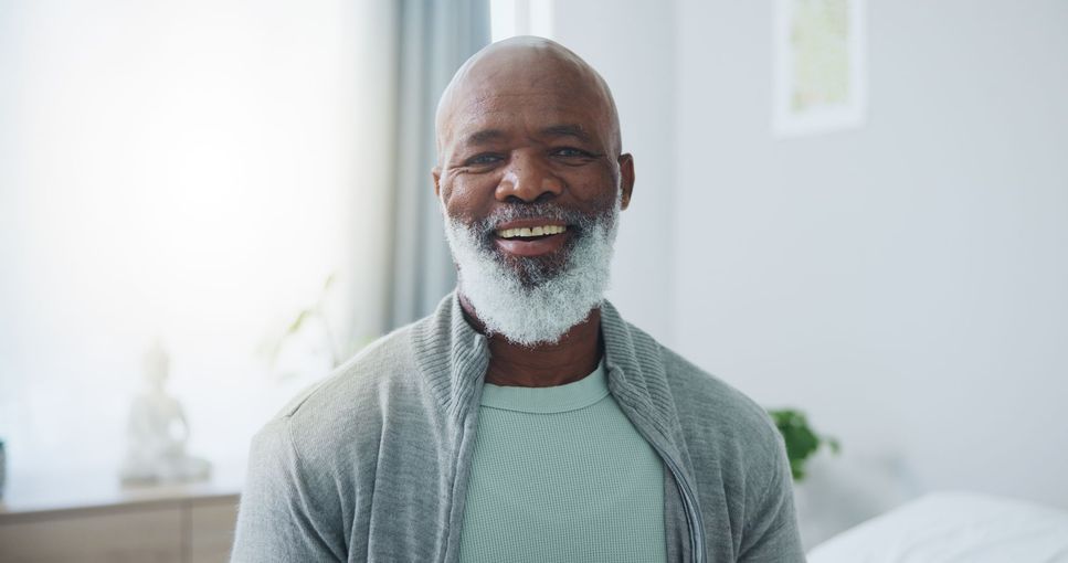 A woman hiking with her husband following close behind