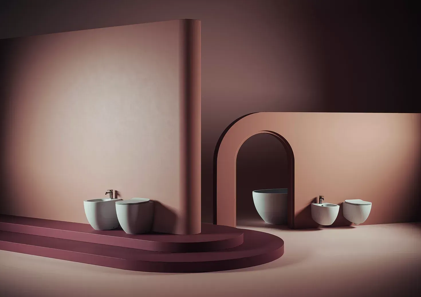 Interno minimalista rosa con nicchia ad arco e piccole ciotole in ceramica sui gradini e sul pavimento.