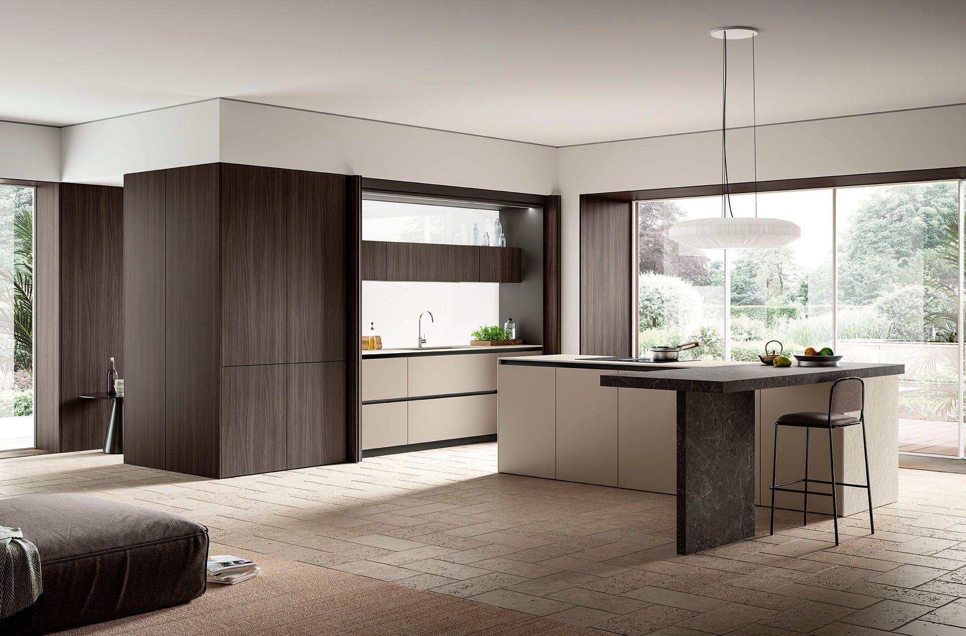 Cucina e zona giorno moderne a pianta aperta con mobili in legno scuro, isola centrale, ampie finestre e arredamento dai toni neutri.