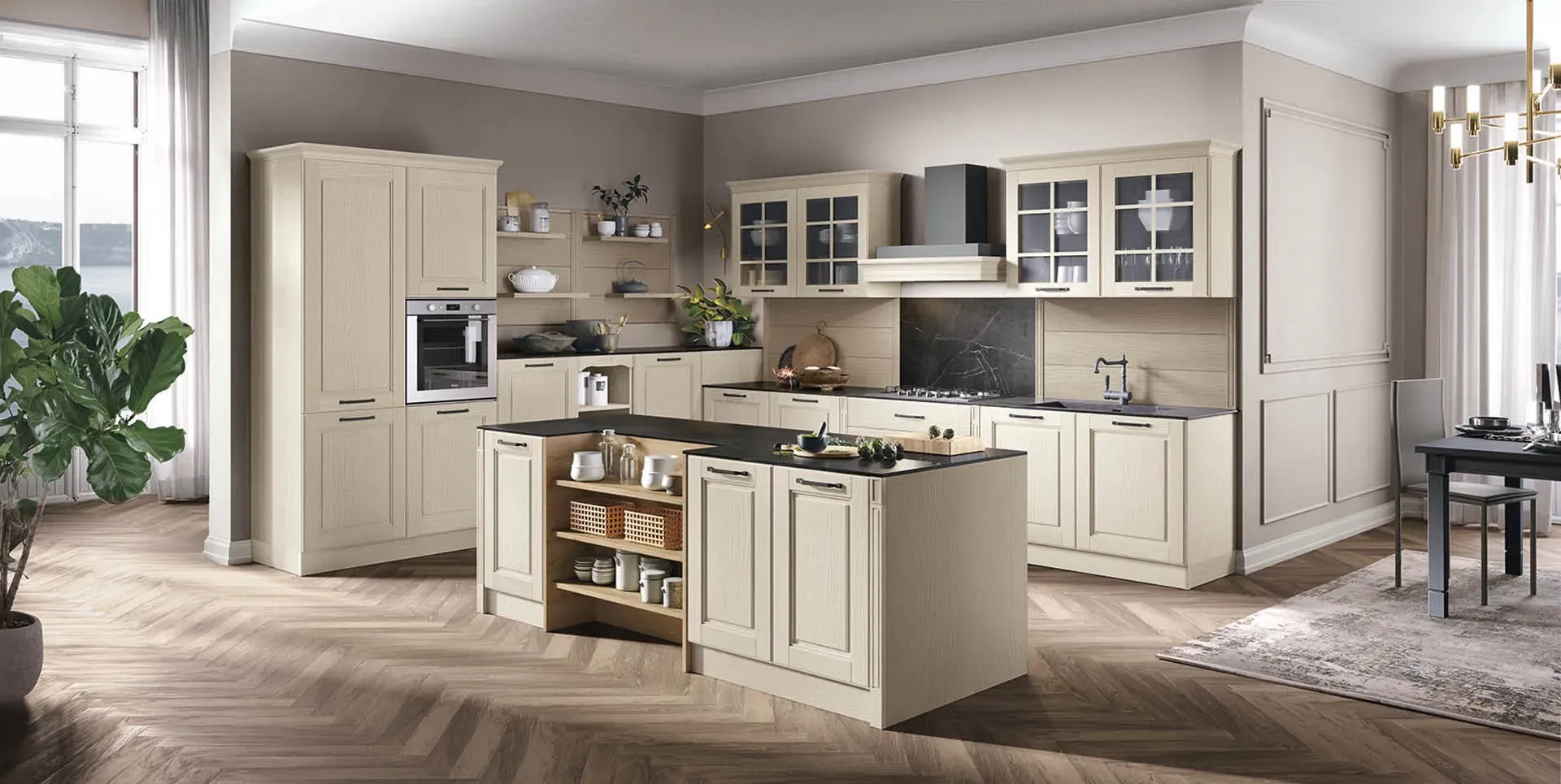 Cucina color beige luminoso con isola, armadietti, tavolo da pranzo e ampie finestre che lasciano entrare una morbida luce naturale.