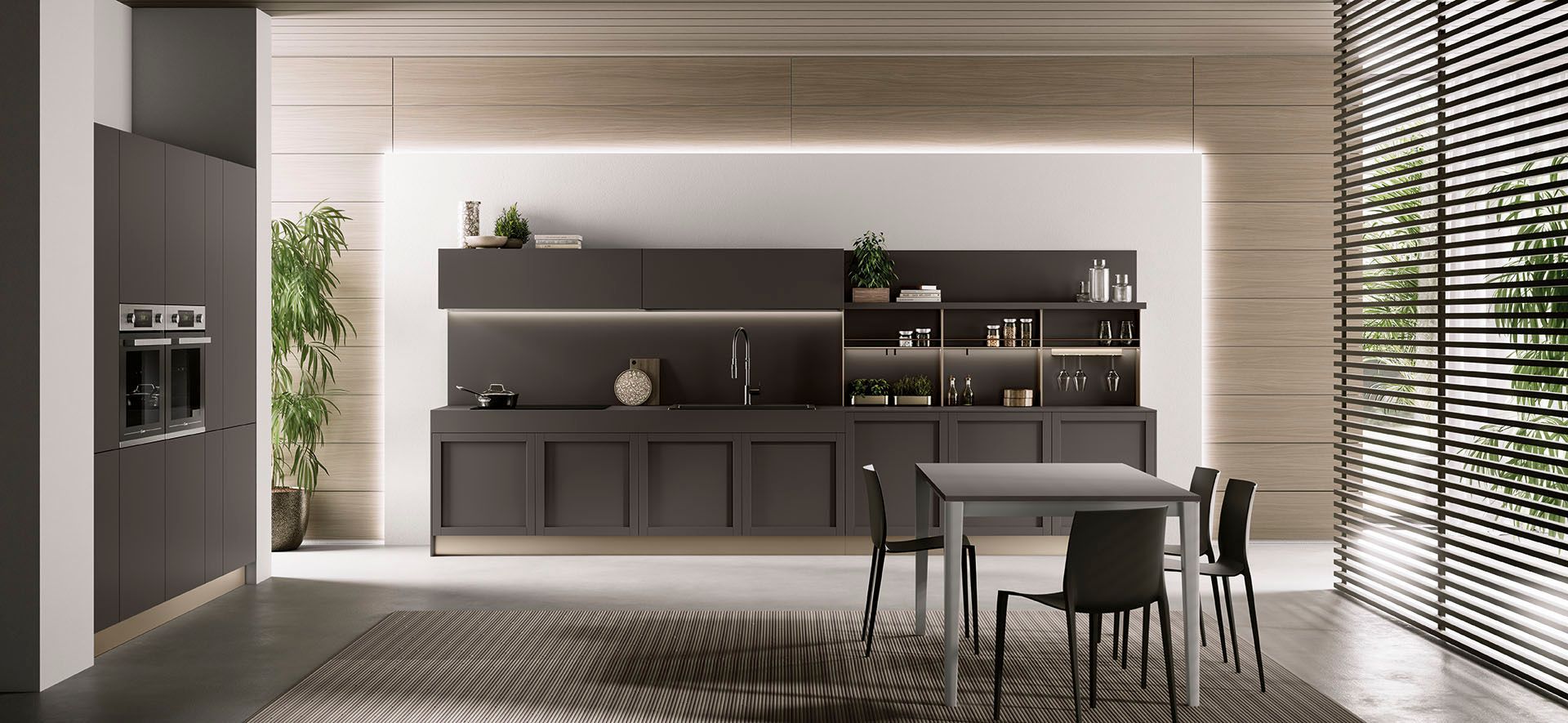 Cucina moderna con mobili scuri, pareti rivestite in legno a listelli, tavolo da pranzo e ampie finestre a tutta altezza.