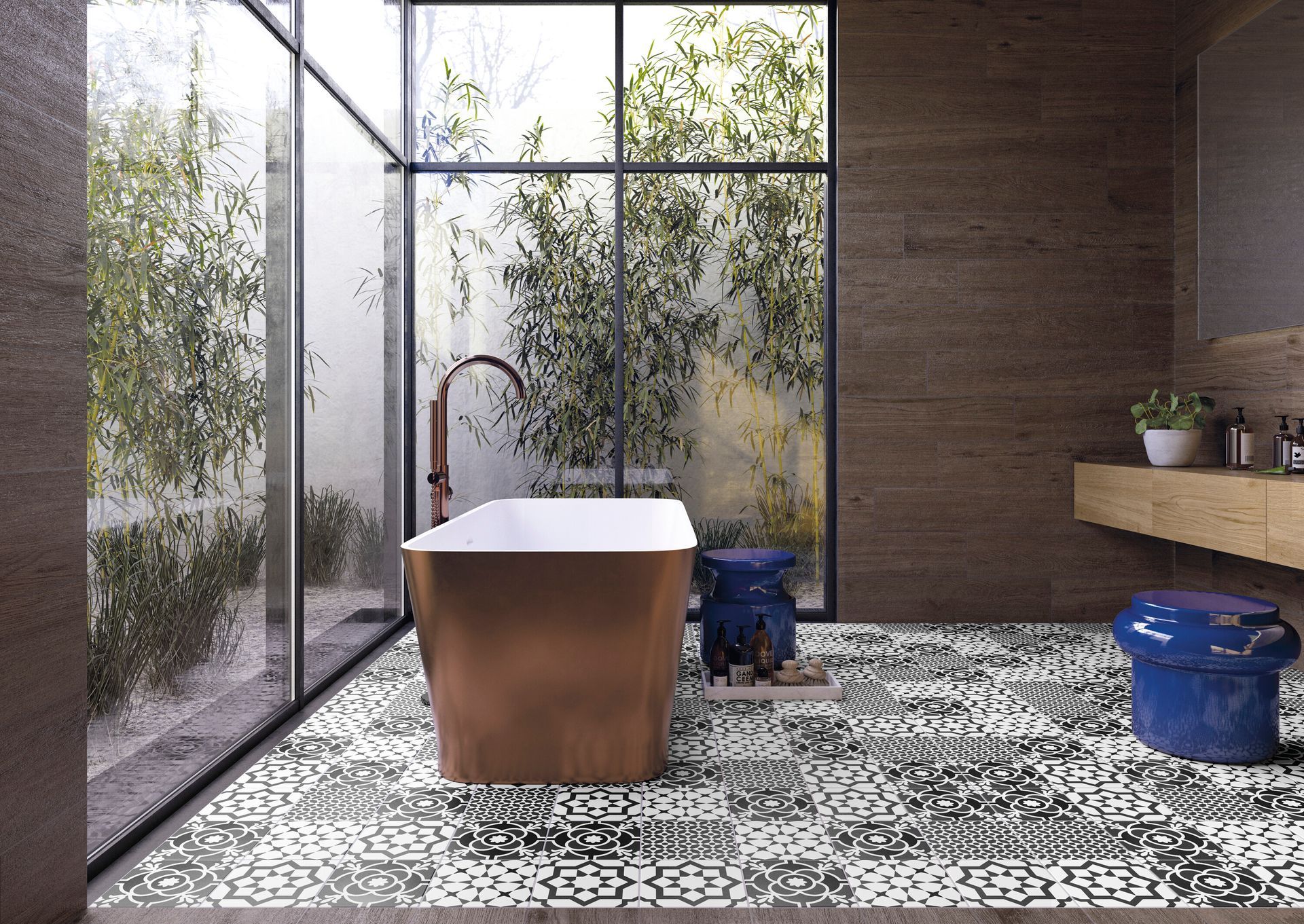 Bagno moderno con vasca freestanding, finestre a tutta altezza, pavimento piastrellato con motivi decorativi e sgabelli blu.