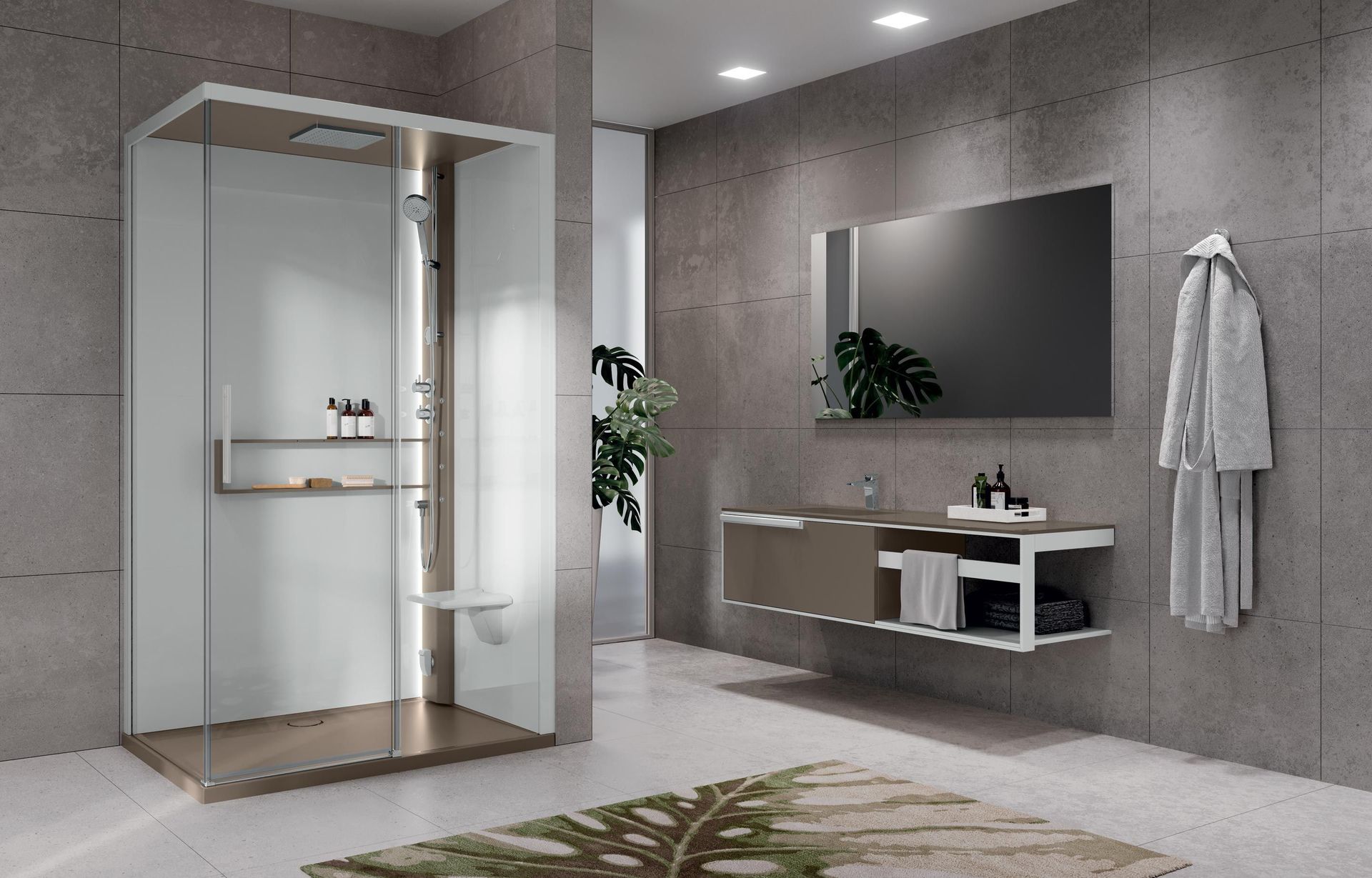 Bagno moderno con doccia in vetro, mobile lavabo sospeso, specchio a parete e pareti rivestite con piastrelle grigie neutre.