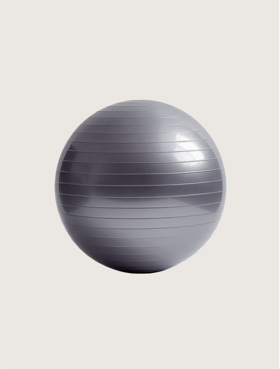 Gray exercise ball on a light background.
