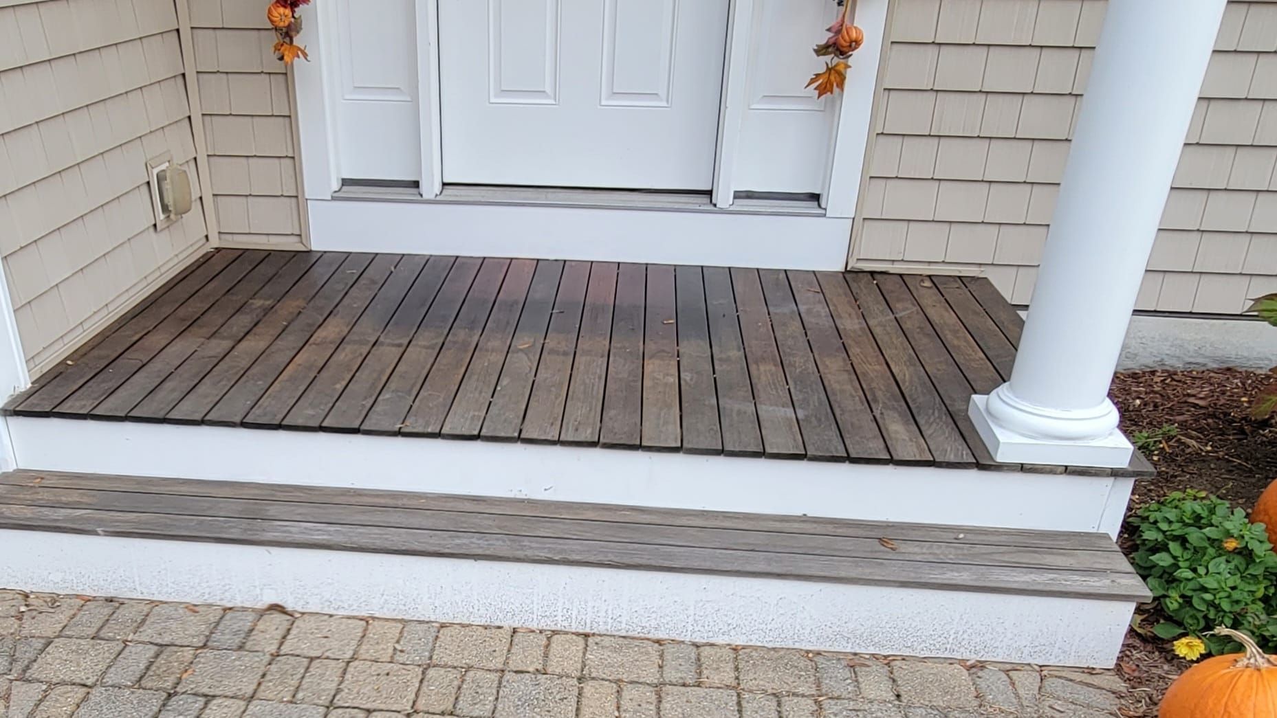 Faded mahogany deck before restoration