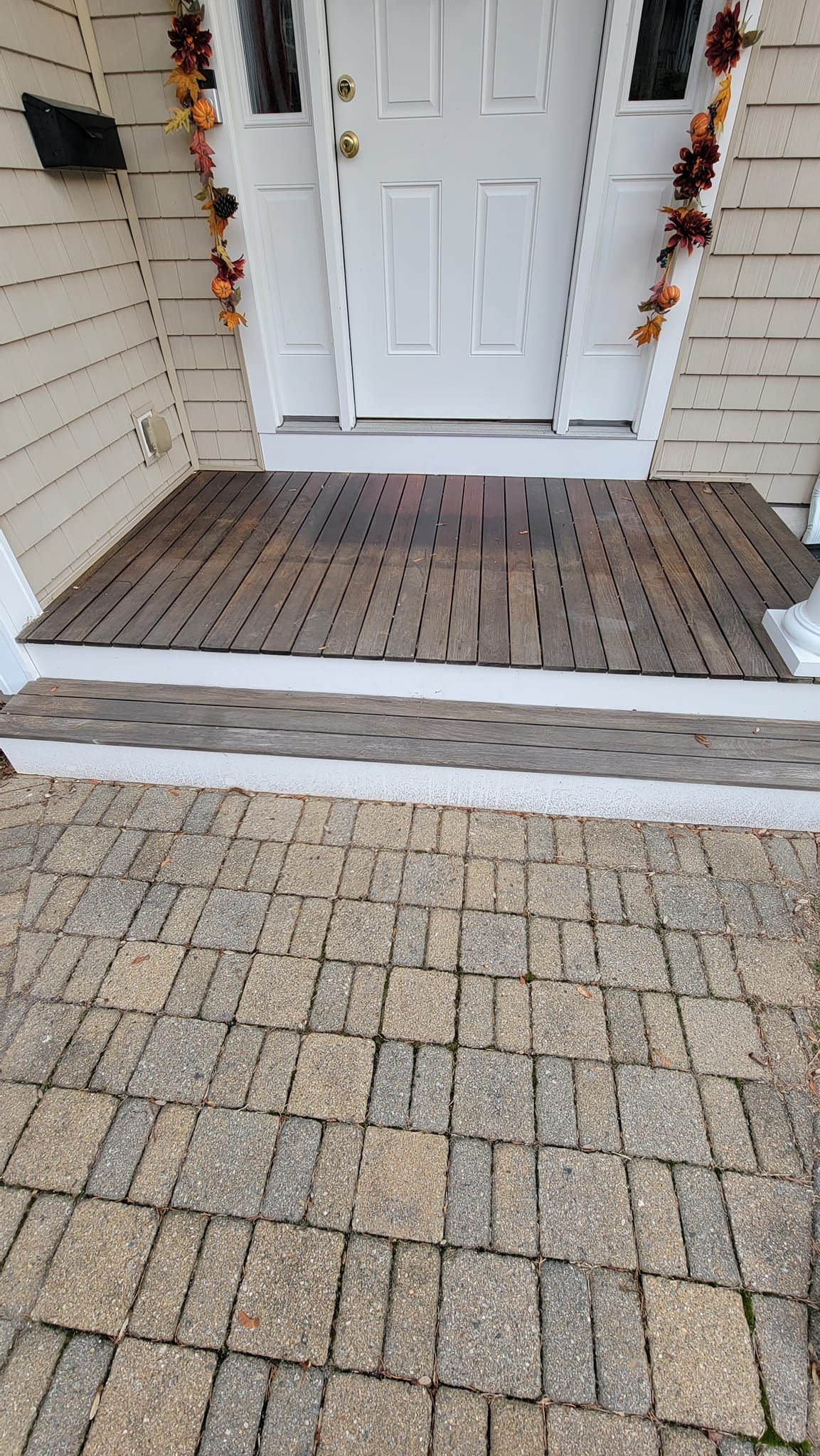 Faded mahogany deck before restoration