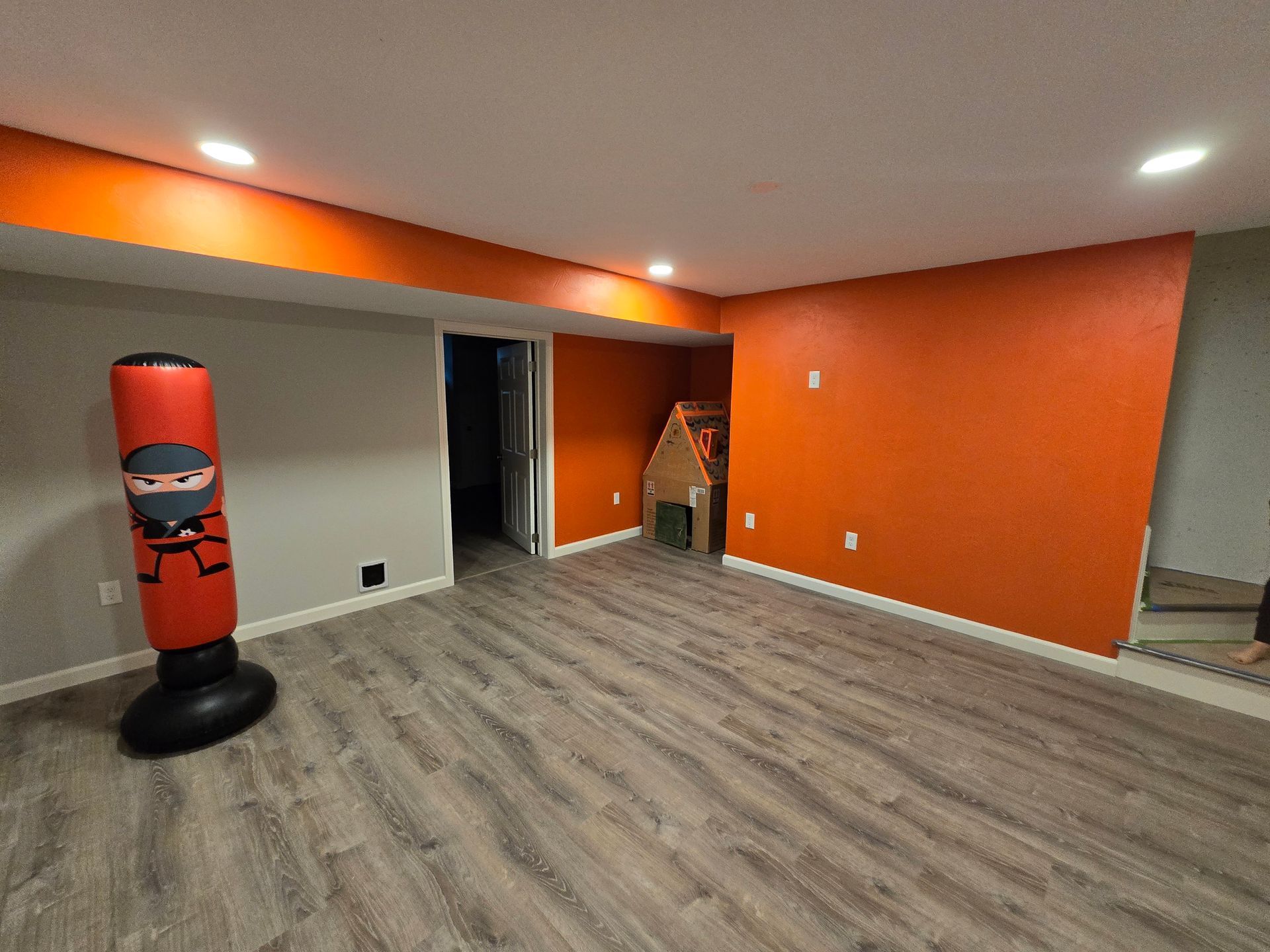 Basement Remodeling Project in Melrose, MA, by New England Painting and Contracting