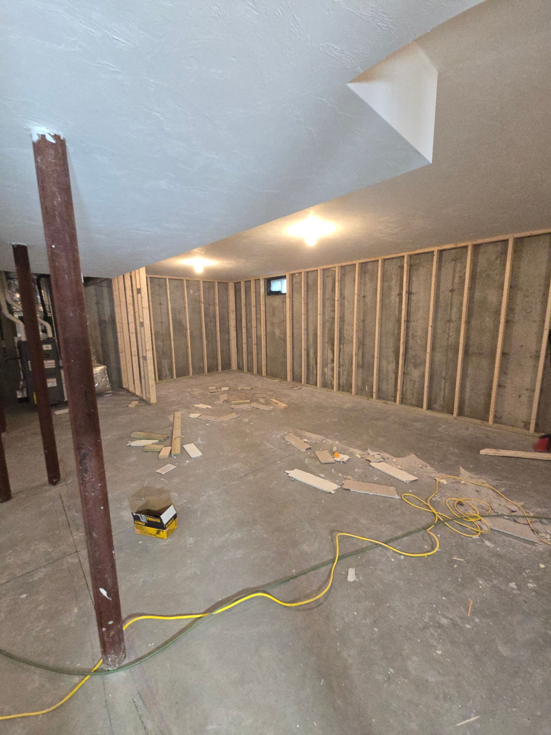 Basement Remodeling Project in Melrose, MA, by New England Painting and Contracting