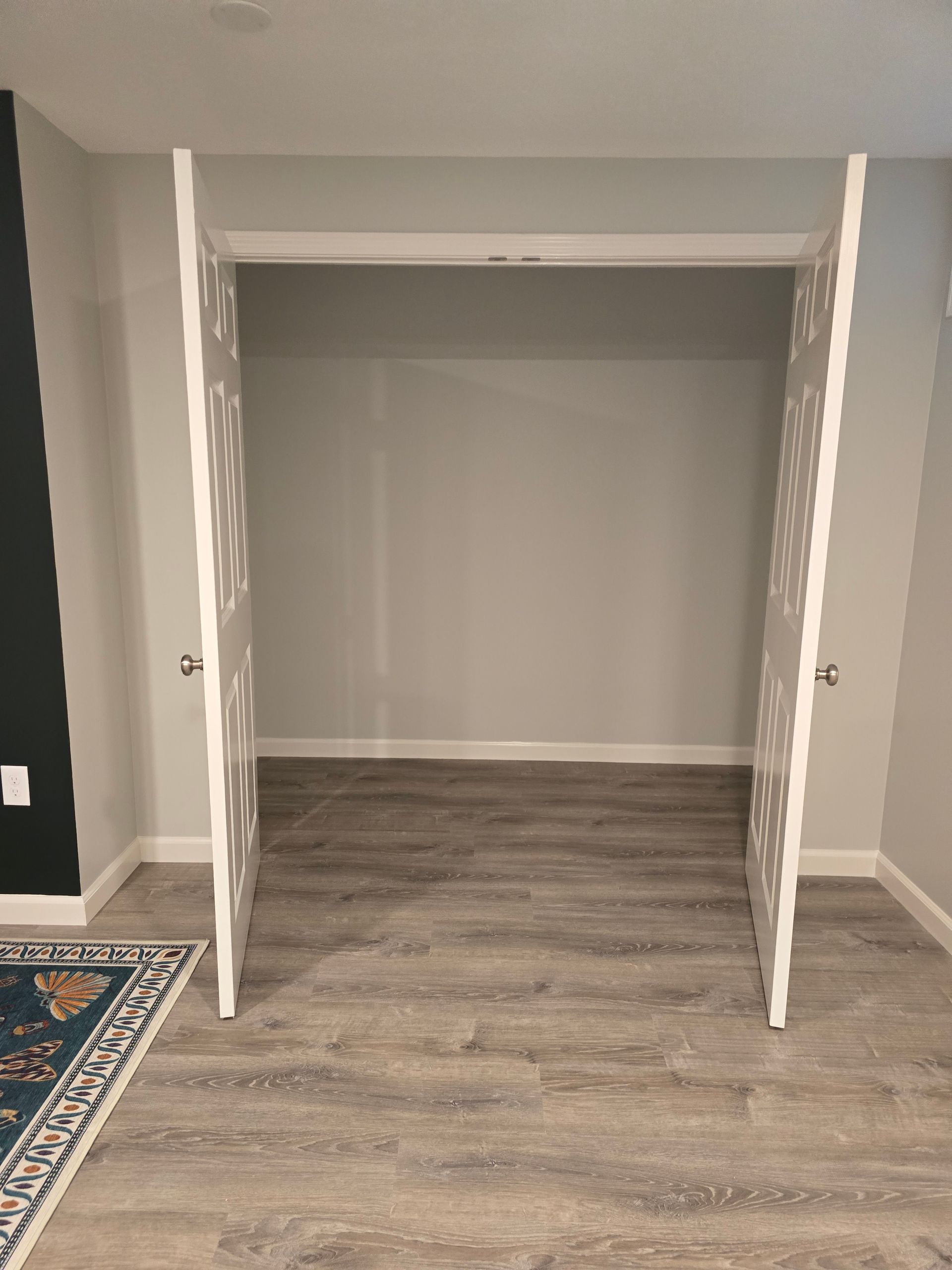 Basement Remodeling Project in Melrose, MA, by New England Painting and Contracting
