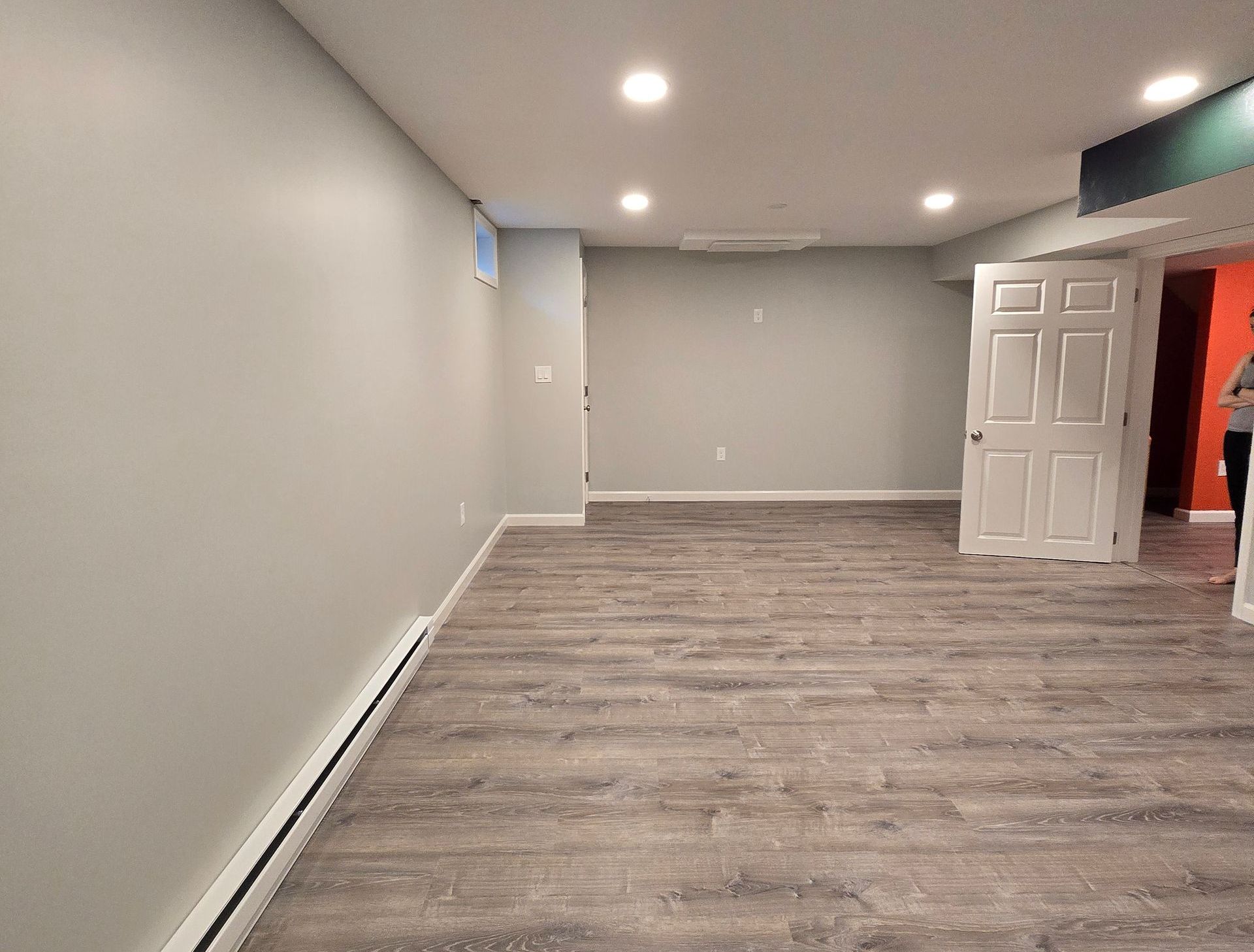 Basement Remodeling Project in Melrose, MA, by New England Painting and Contracting