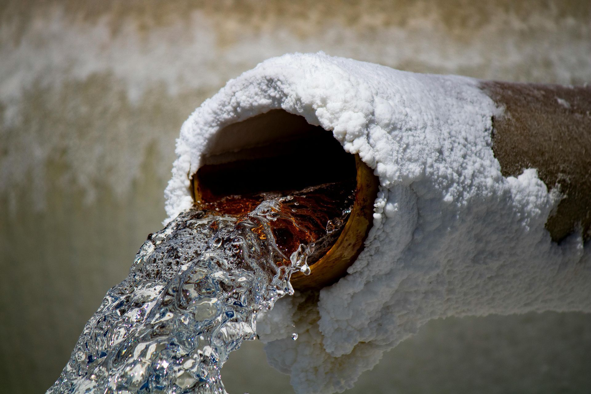 Pipe corrosion signs showing rusted metal plumbing with potential leak damage