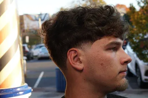 Modern skin fade haircut expertly crafted at Swagger & Blade barbershop in Monmouth County, NJ.