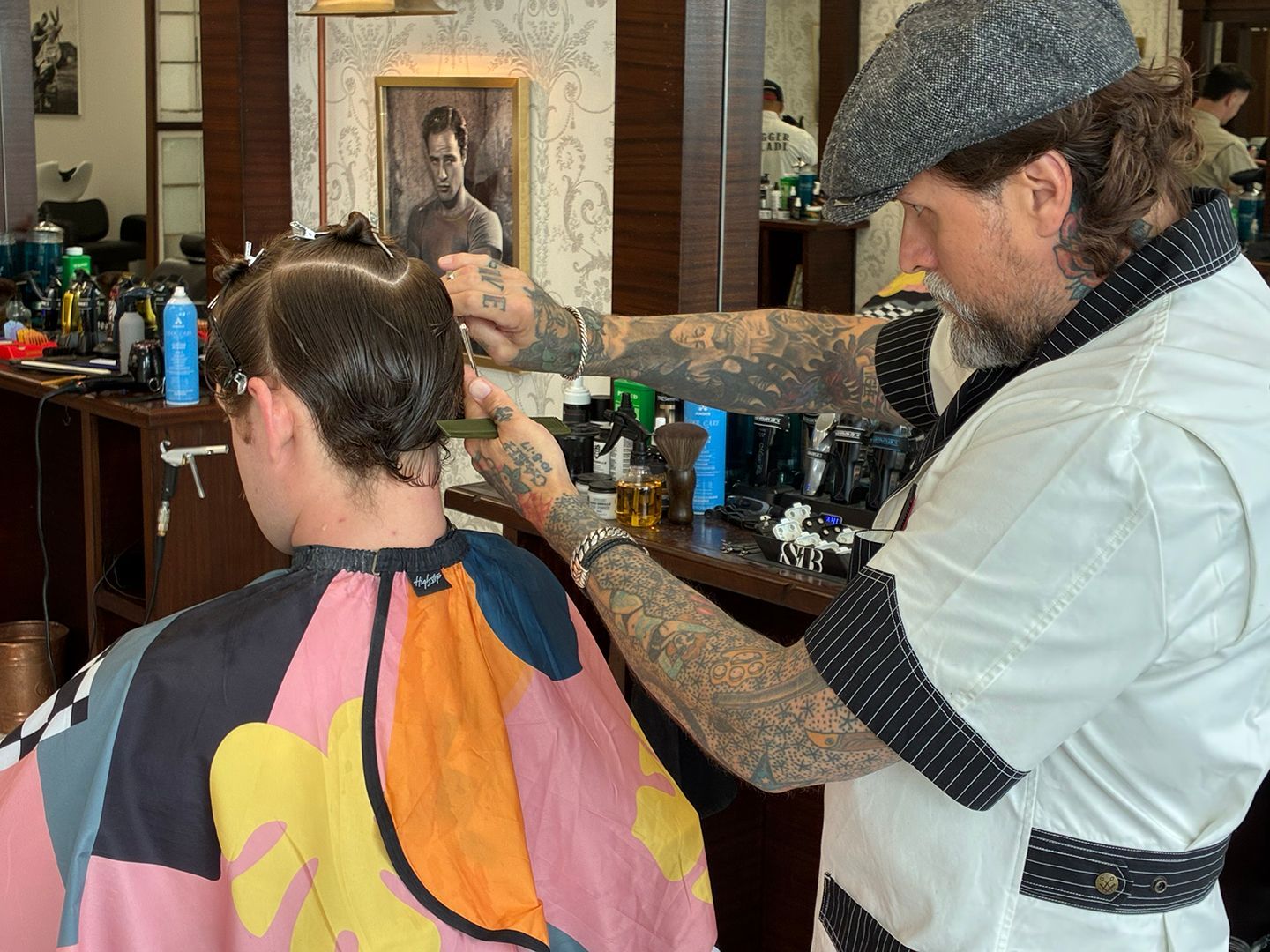 Master barber creating a custom men's haircut at Swagger & Blade barbershop in Monmouth County, NJ.