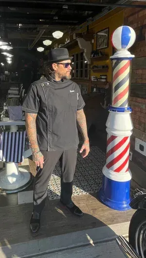 Barber pole and vintage barbershop atmosphere at Swagger & Blade in Monmouth County, New Jersey