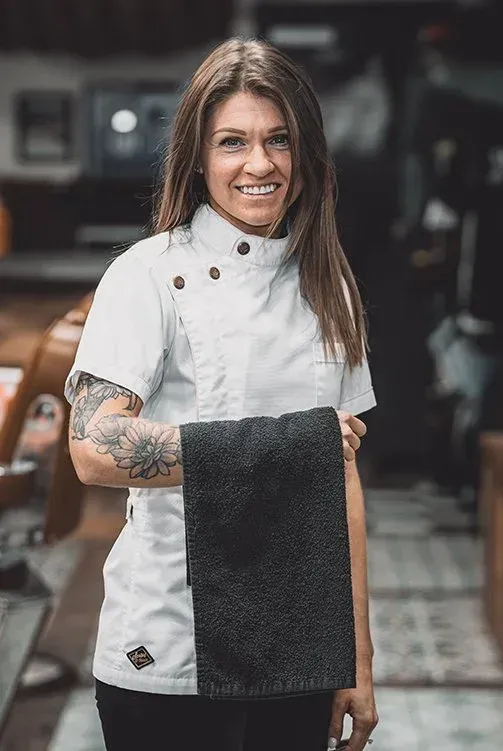 Amber Rae, barber at Swagger & Blade offering men's haircuts, fades, and grooming services in Monmouth County, New Jersey.