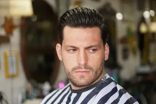 Professional men's hairstyle and grooming service completed at Swagger & Blade barbershop in Monmouth County, NJ.