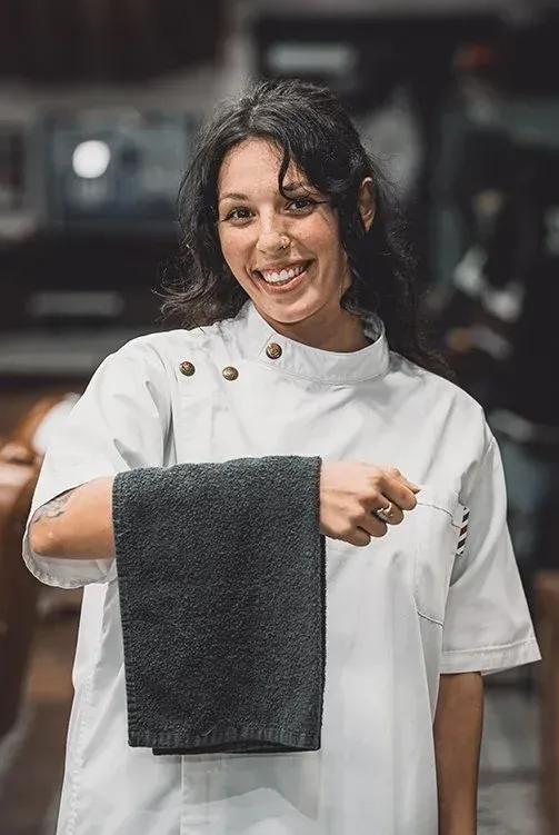 Kayla LaVacca, barber at Swagger & Blade offering men's haircuts, skin fades, beard trims, and grooming services in Monmouth County, NJ.