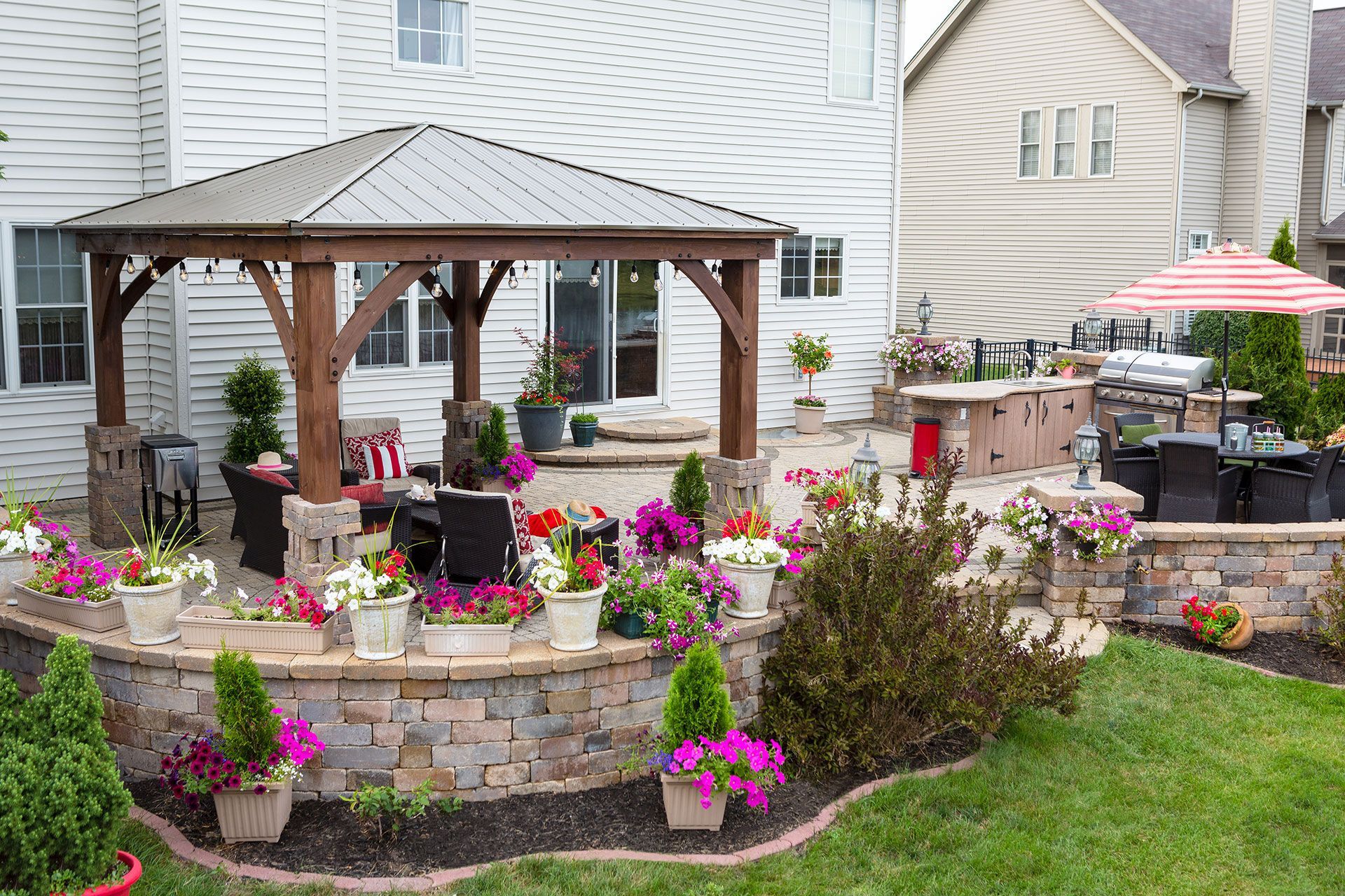 Colorful exterior curved patio with summer flowers