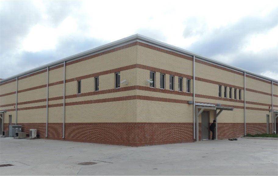 A large brick building with a lot of windows
