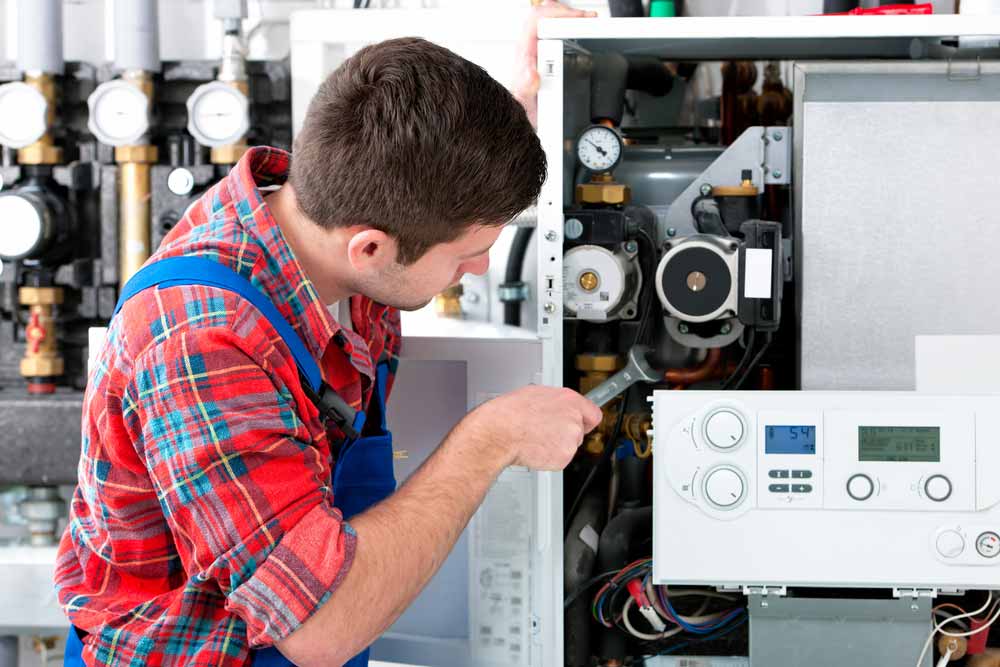 Technician Doing Gas Fitting Repairs