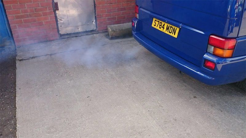 Blue car with new exhaust fitting