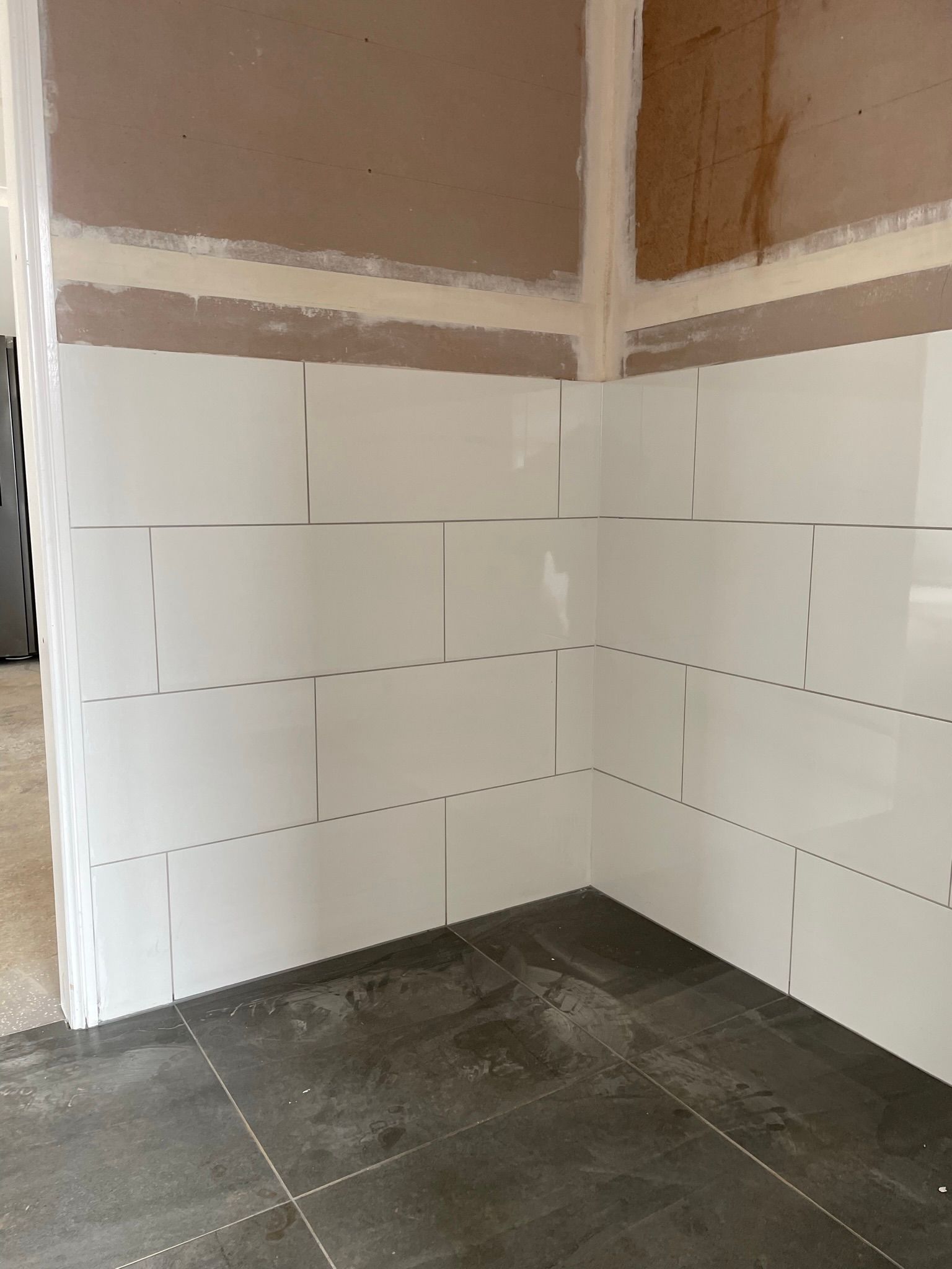 White Tiles Installed on a Corner Wall — Taylormade Constructions & Renovations In Yarraman, QLD