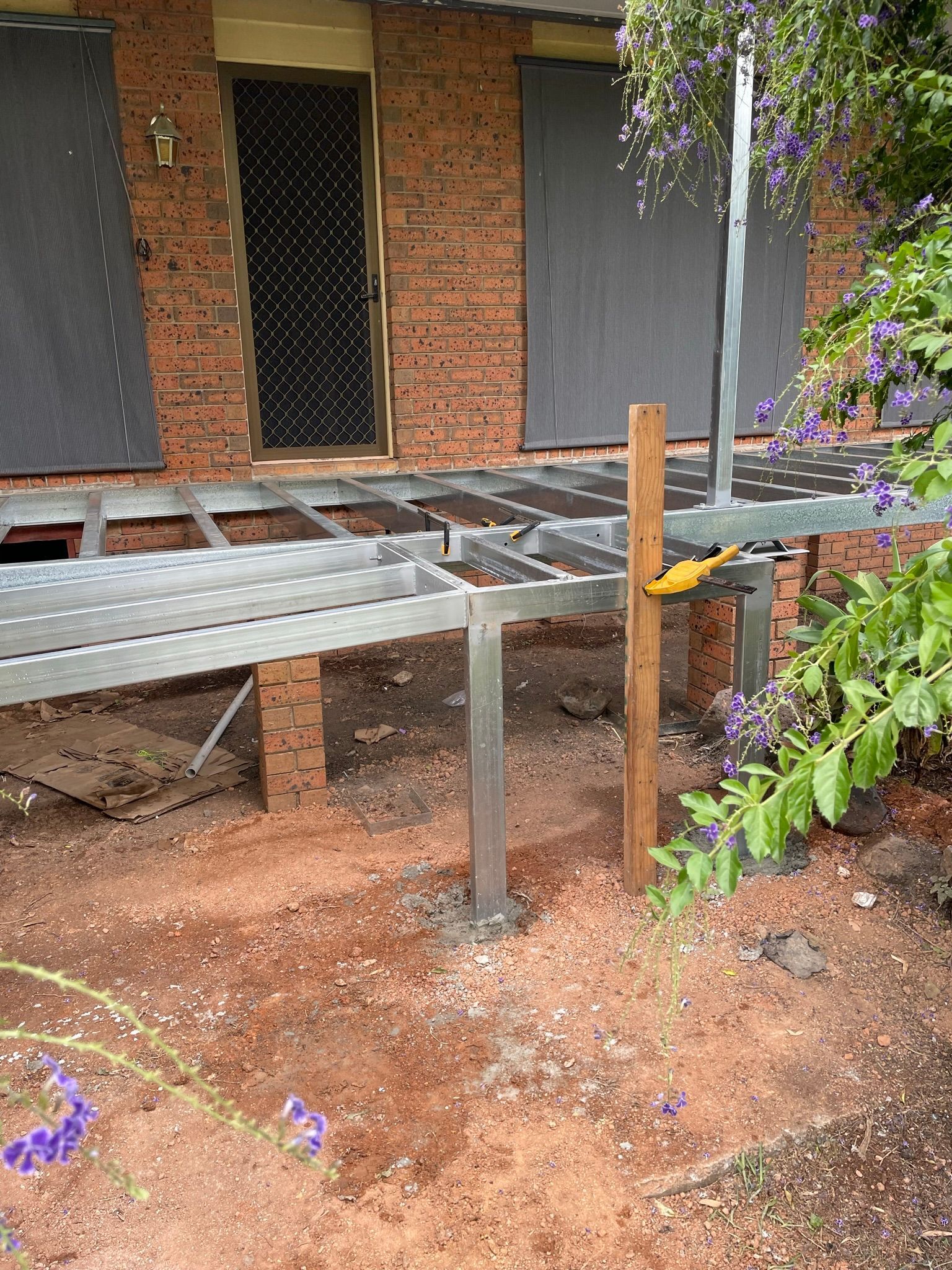 Steel Deck Frame Under Construction With Exposed Brick Home — Taylormade Constructions & Renovations In Kingaroy, QLD