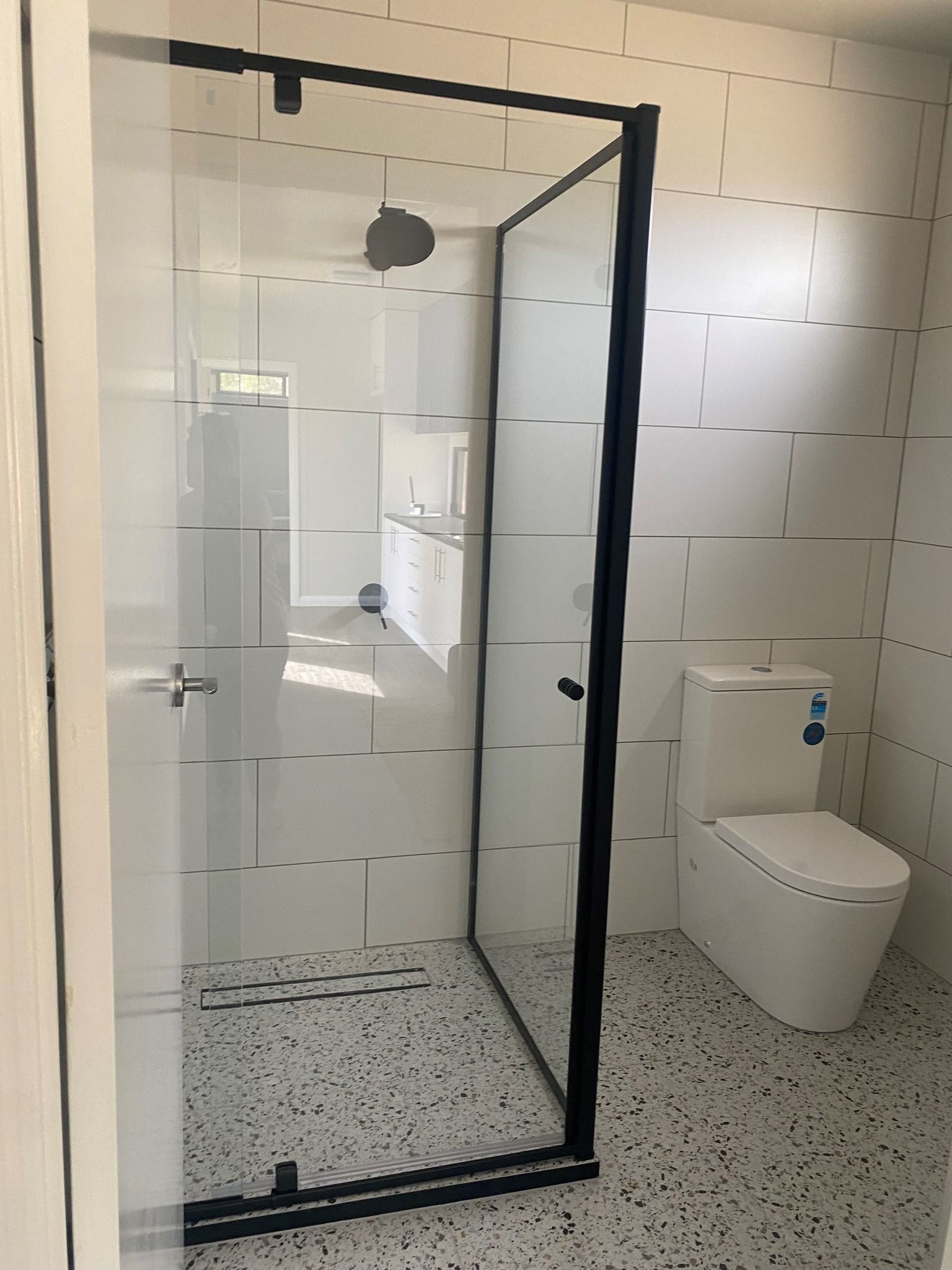 Modern Bathroom With Black-framed Shower — Taylormade Constructions & Renovations In Kingaroy, QLD