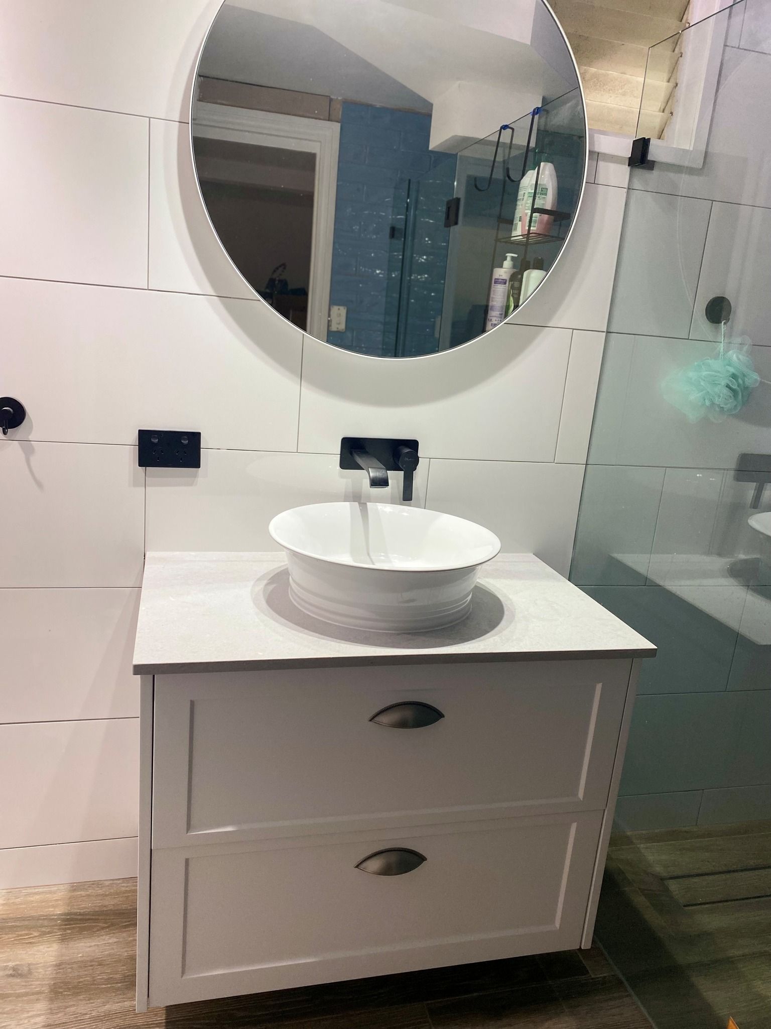 White Bathroom Vanity With a Round Sink, Mirror, and Shower — Taylormade Constructions & Renovations In Memerambi, QLD