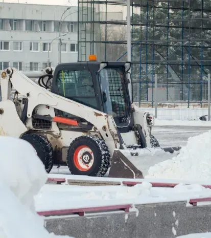 Commercial snow removal and snow plowing services for parking lots and commercial properties