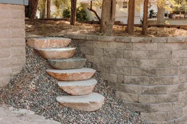 Custom hardscaping installation adding long-lasting stone and structural elements to outdoor spaces