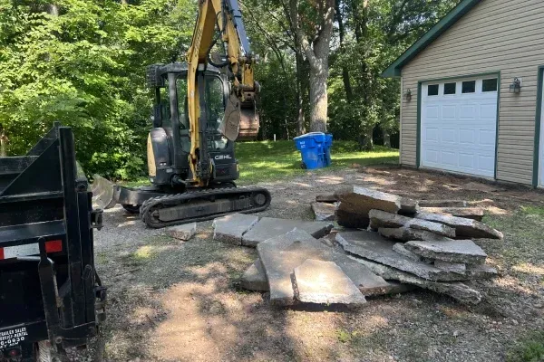Land clearing and excavation services preparing sites for construction and outdoor development