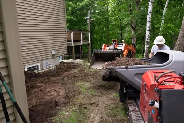 Site grading in North Branch, MN preparing land for landscaping or building with proper slope control